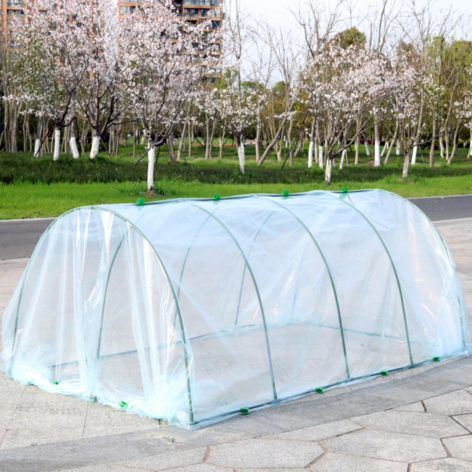 Serre à monter soi-même pour un jardin fonctionnel et élégant. Mini serre d'extérieur fabriquée en tube de fer, portable et dotée d'une housse imperméable.